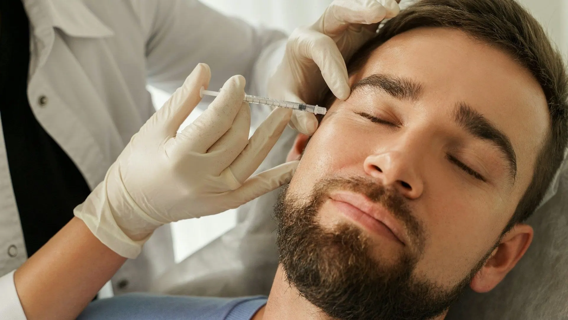 Male patient receiving anti-wrinkle treatment at The Aesthetics Doctor