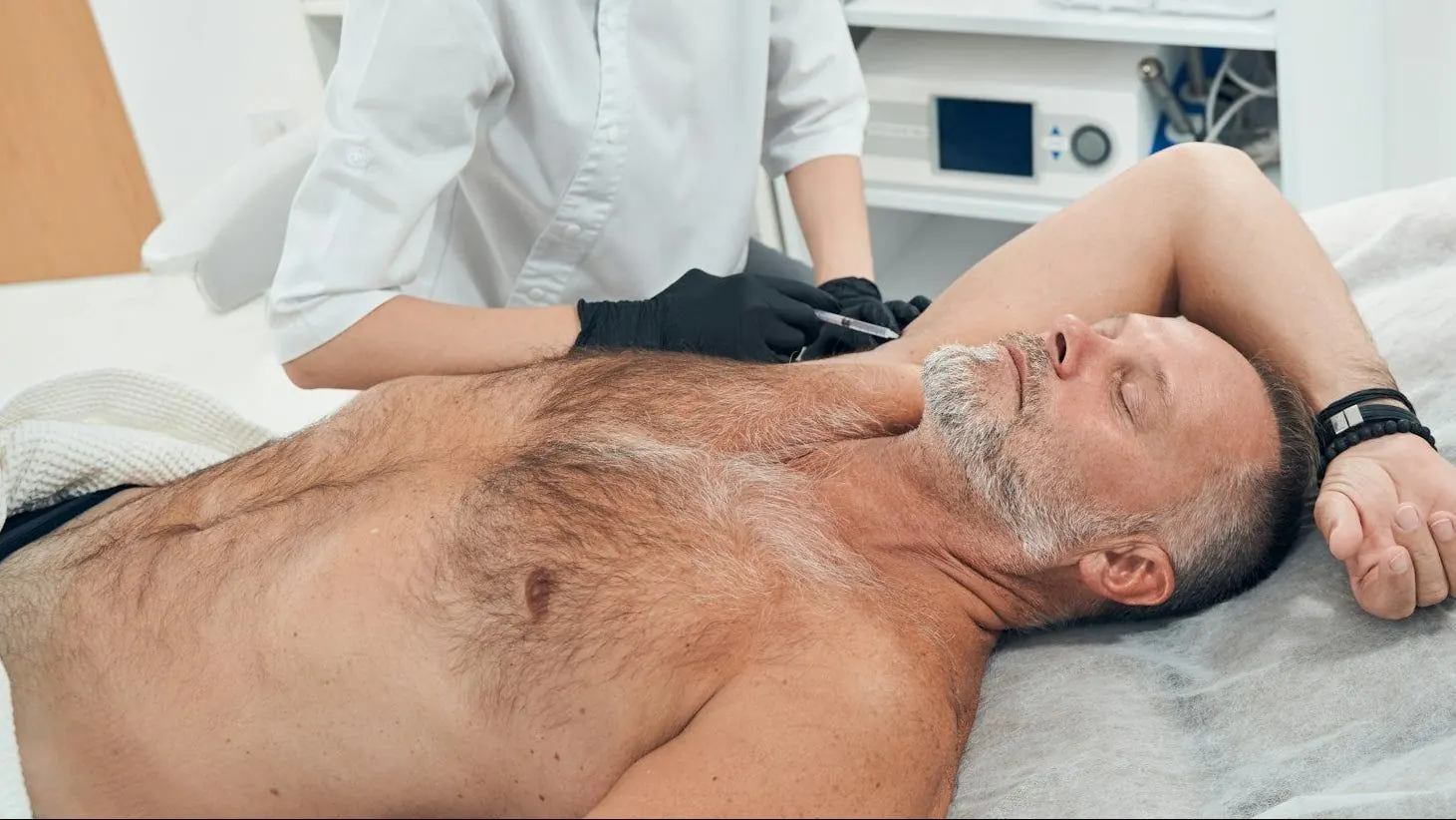 Patient receiving underarm hyperhidrosis treatment