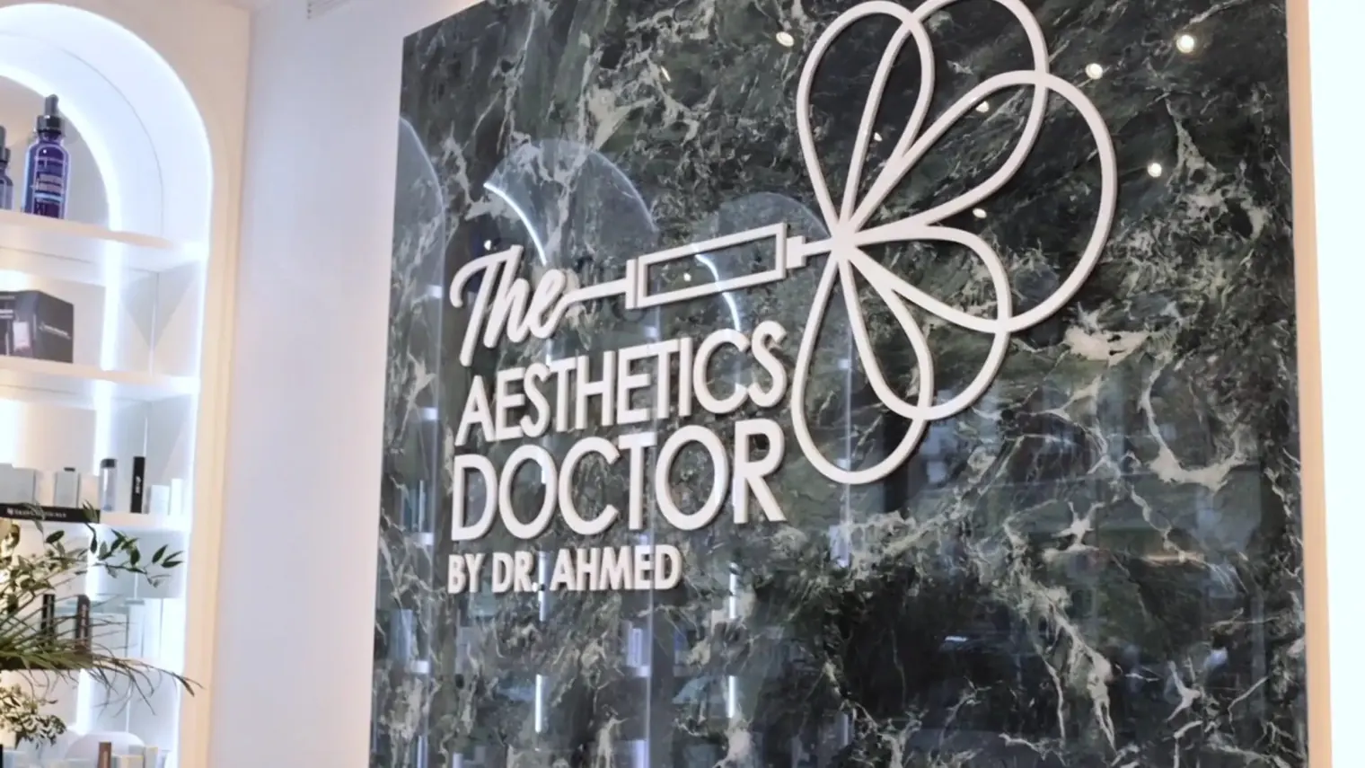 The Aesthetics Doctor sign in the Mayfair clinic reception